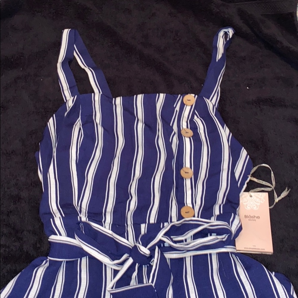 Navy blue and white striped mid jumpsuit.